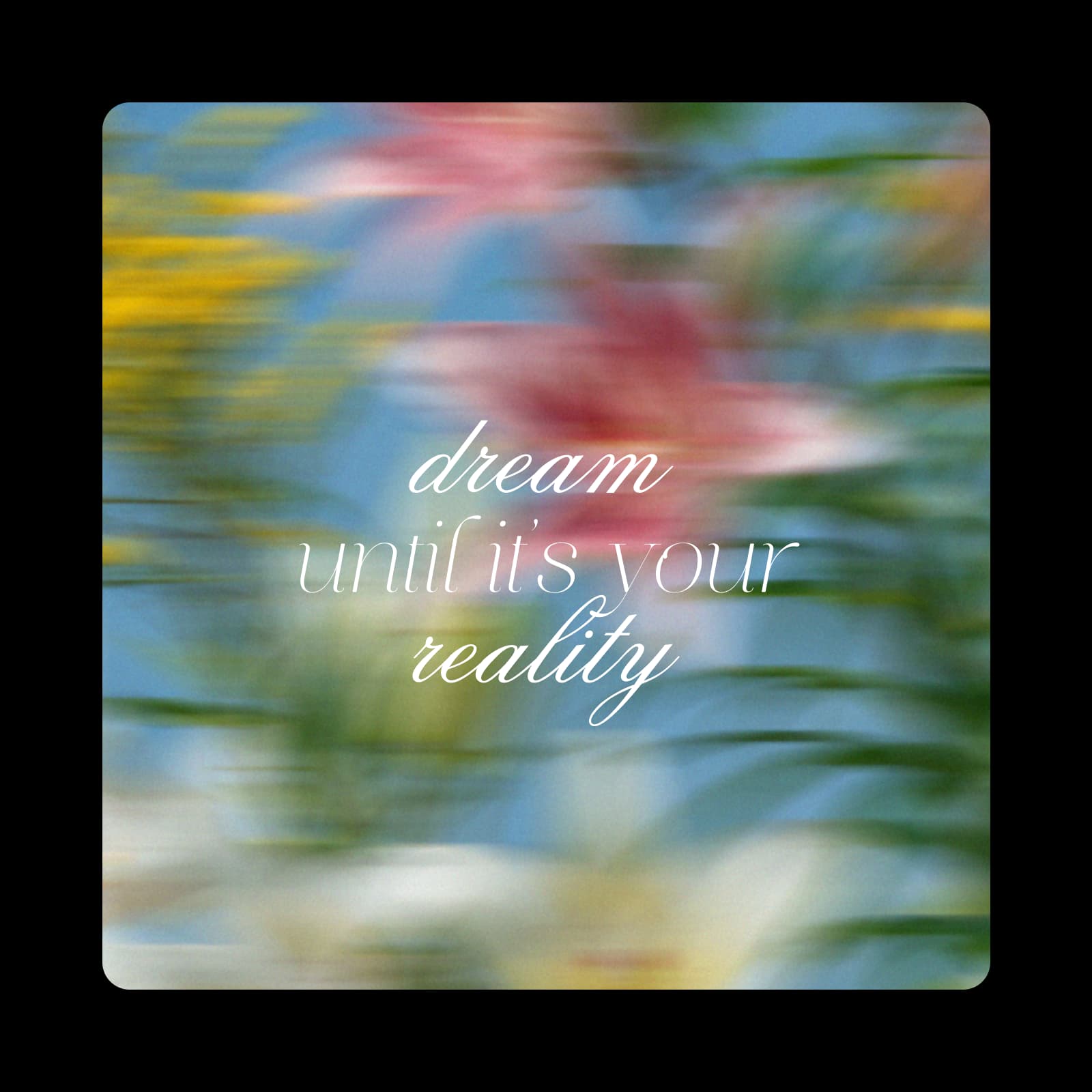 Blurred floral wallpaper with the quote dream until it's your reality