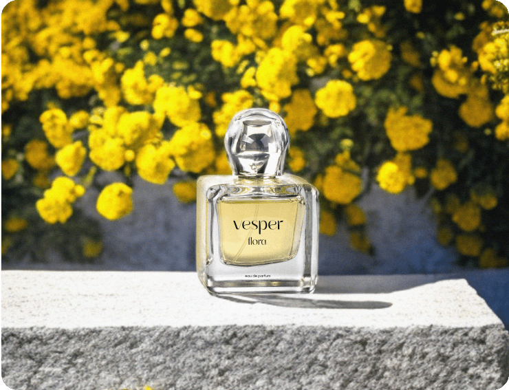 Perfume on flowers background