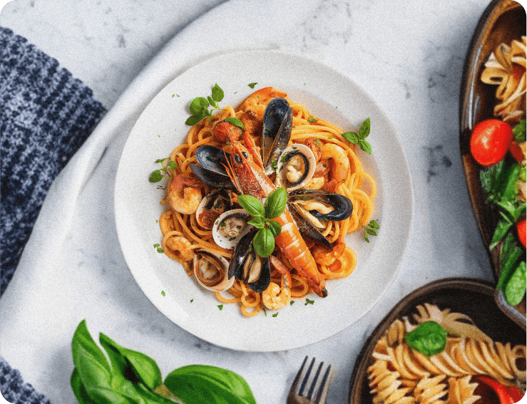 Spaghetti on a white tablecloth