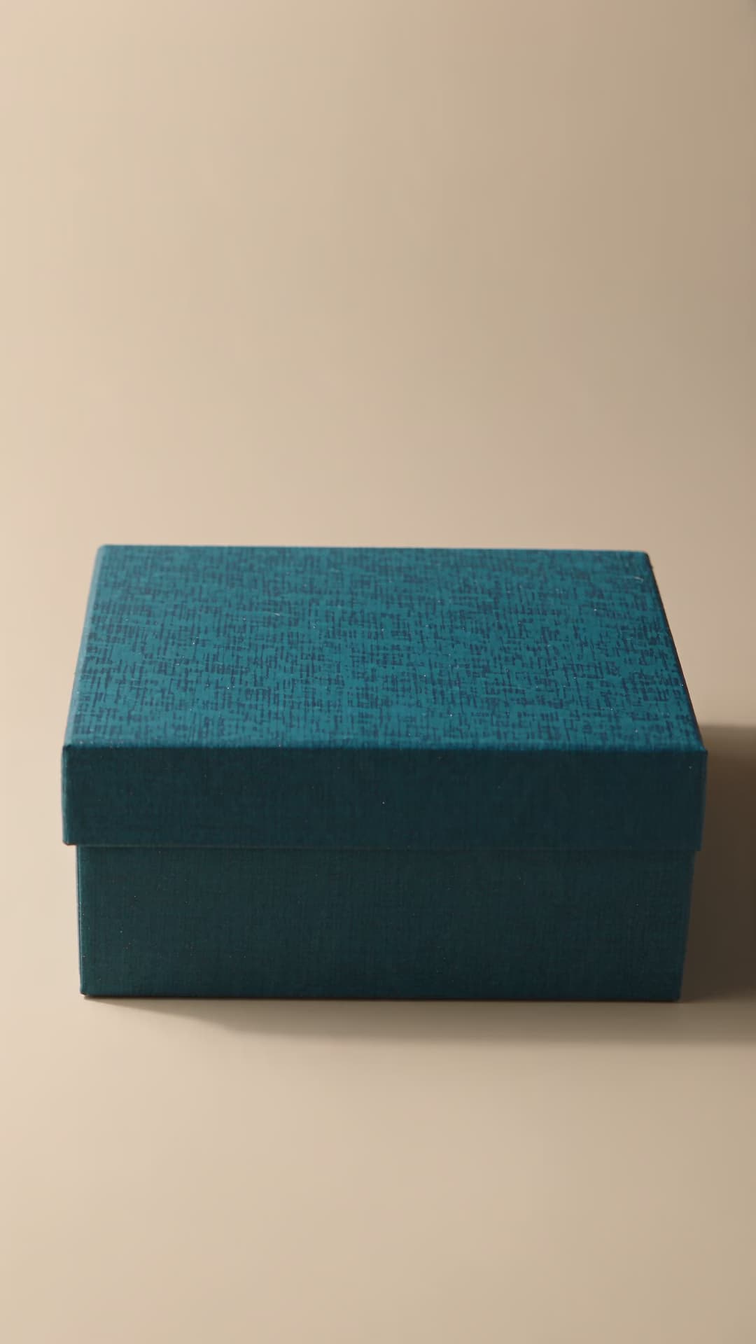 Handcrafted gift box with unbranded sweets and marigold petals.