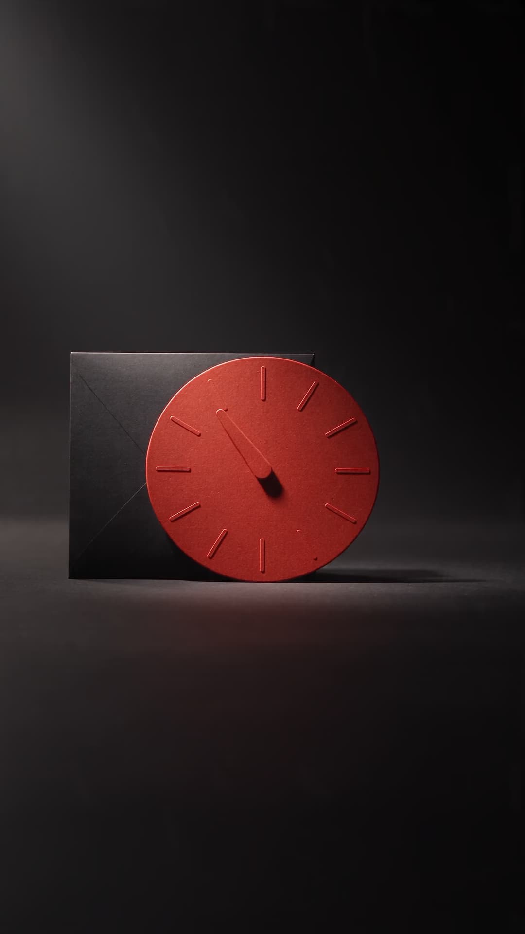 Red paper countdown dial beside an unbranded package.