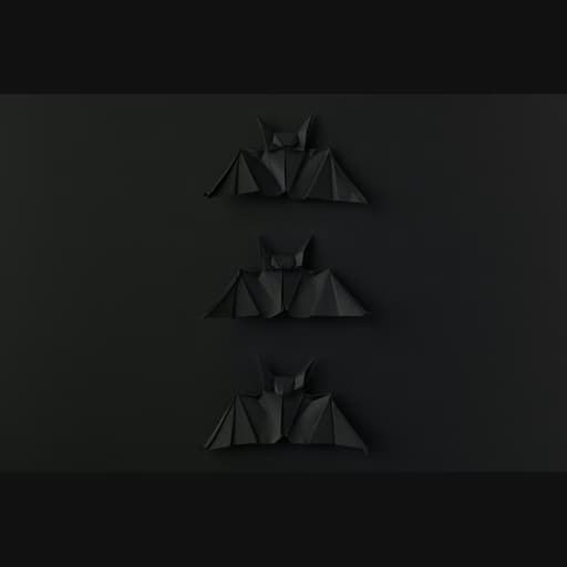 Schwarze Origami-Fledermäuse auf dunklem Hintergrund.